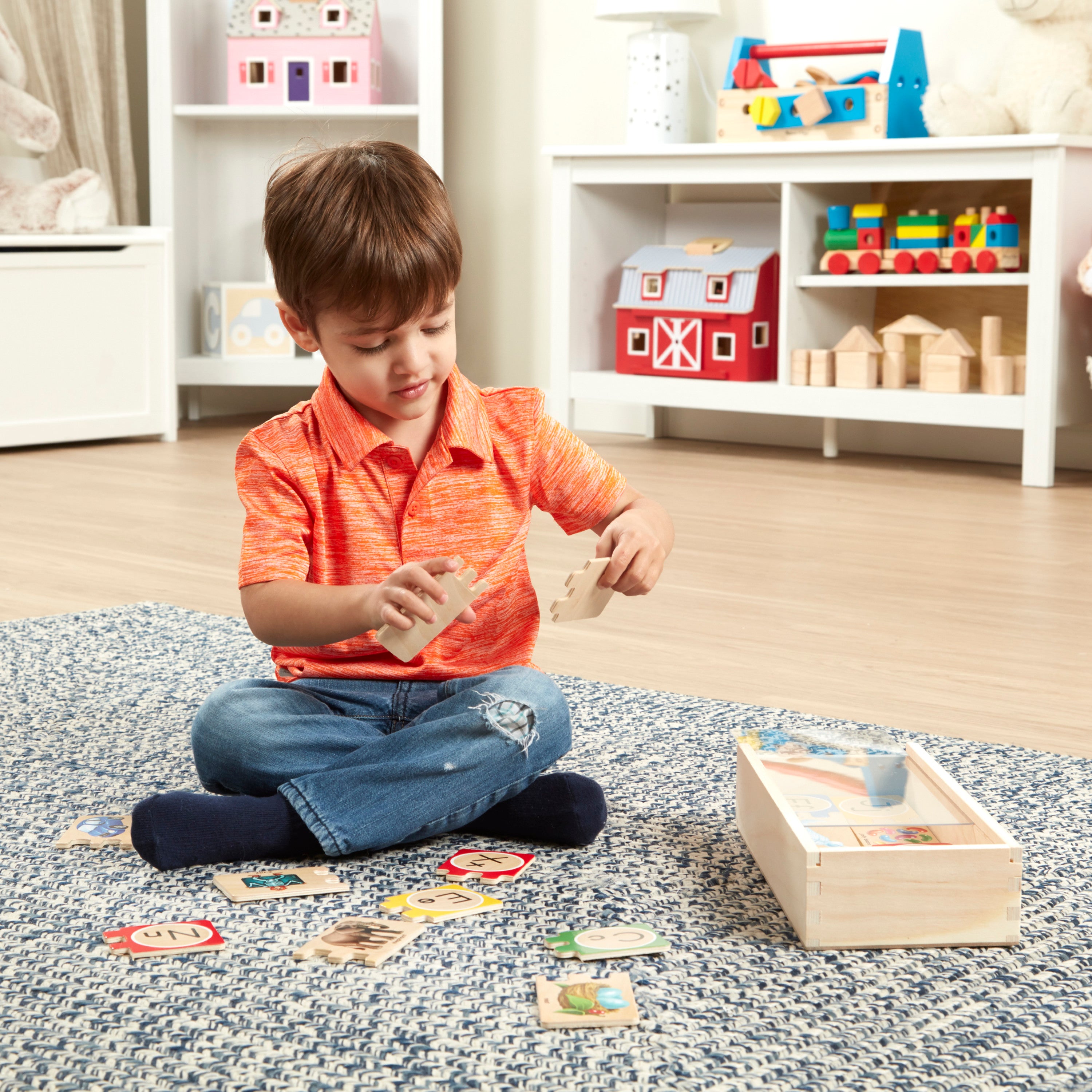 Close-up of letter puzzle pieces with vibrant pictures
