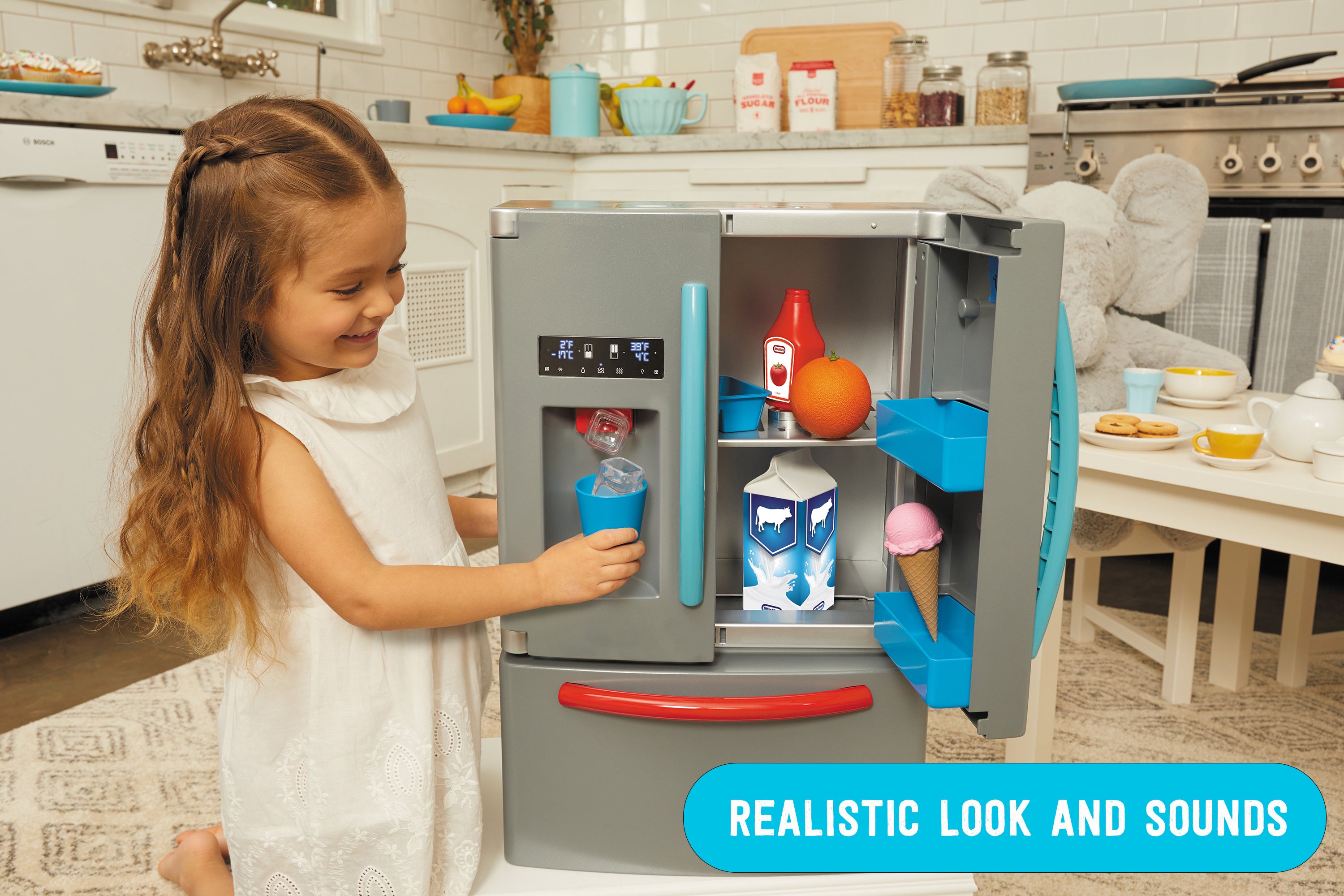 Little Tikes First Fridge showcasing dual French doors and freezer.
