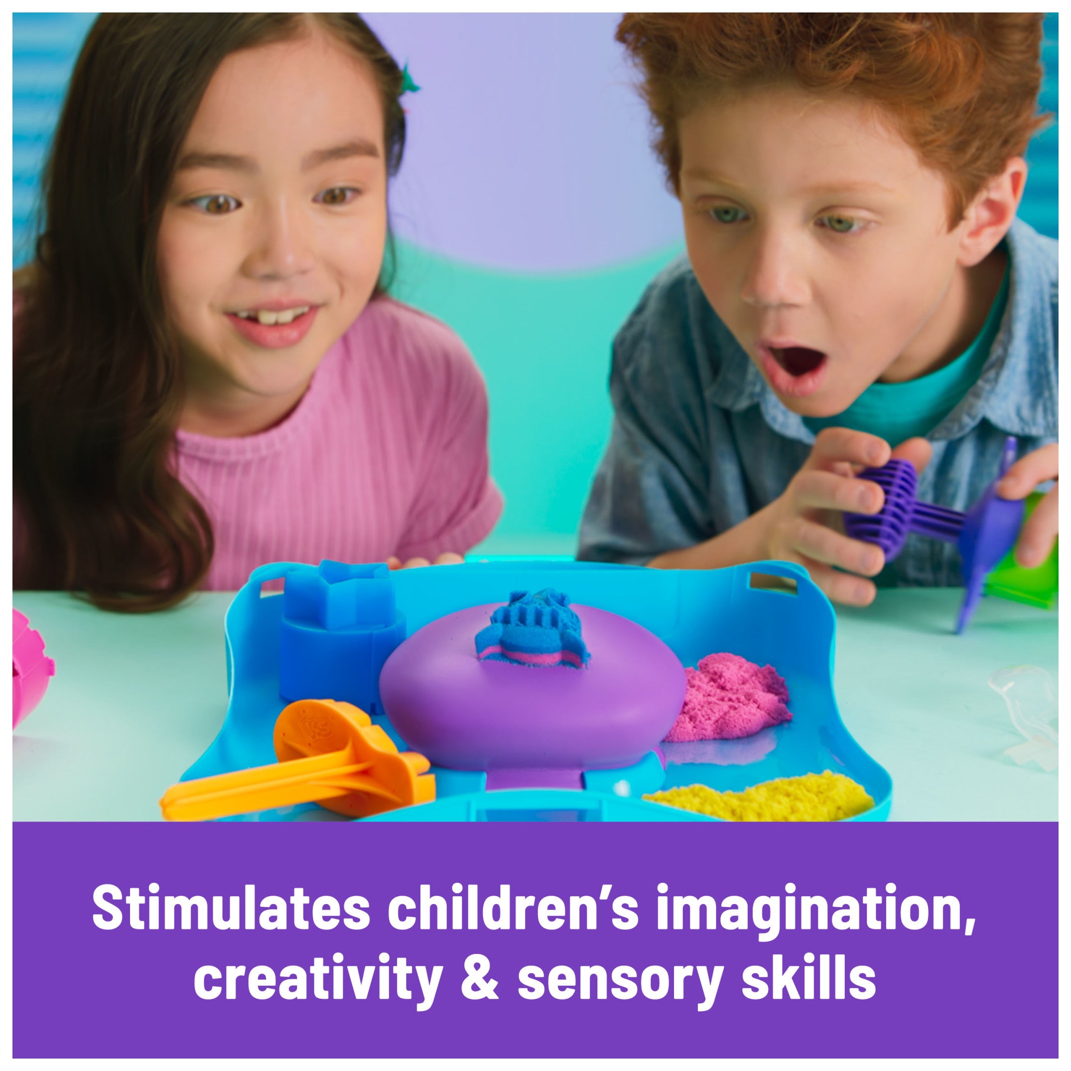 Kids playing with the Kinetic Sand SquishMotion Playset
