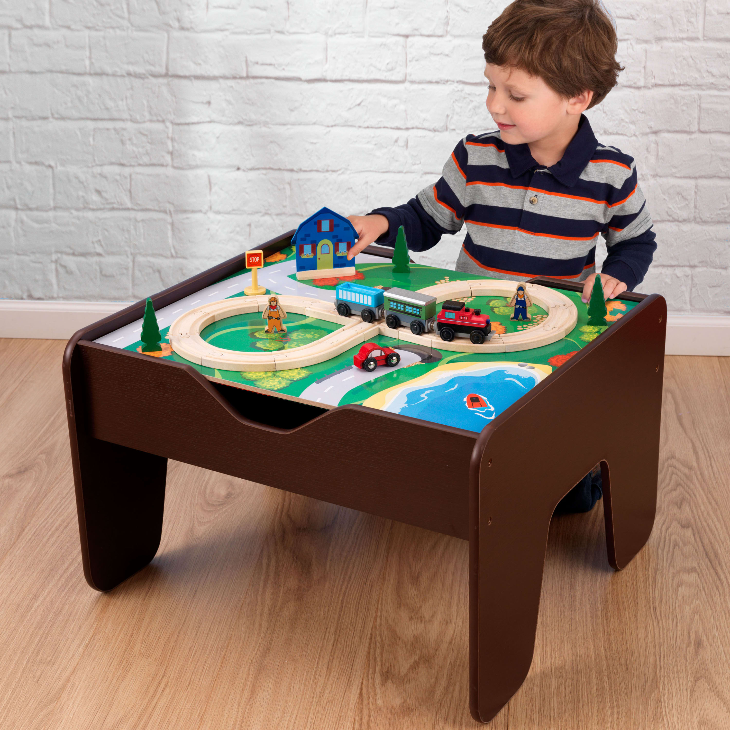 Two-sided play surface with smooth illustration and building brick compatibility
