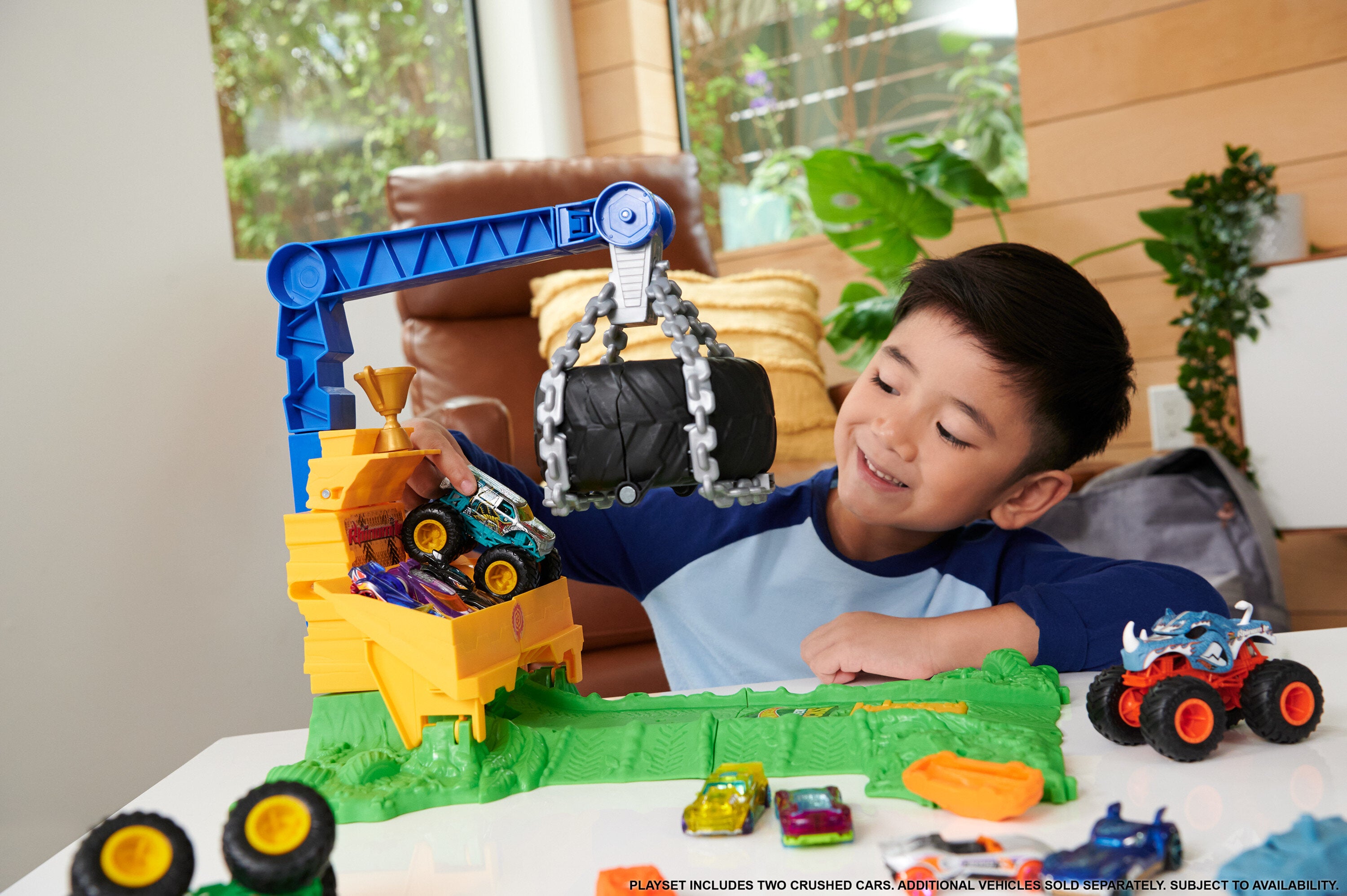 Monster Truck smashing through obstacles playset
